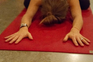 A trainee practices during Yoga Outreach's Trauma-Informed Yoga Training